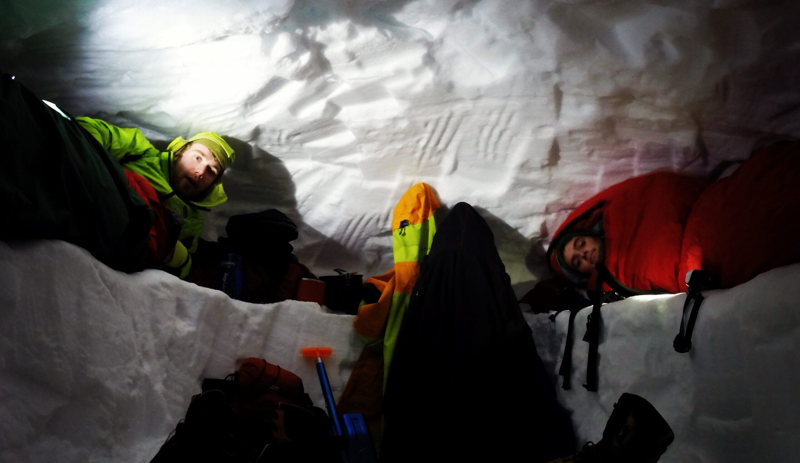 Image of Ross and Chris in a Snow hole in the Cairngorm National Park 